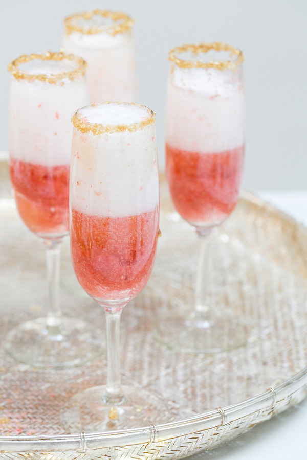 Champagne and Strawberries with a Gold Rim | Sugar and Charm | Six Champagne Cocktails to Try this Winter