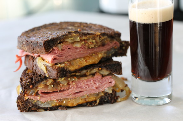 8 Savory Guinness Recipes - Corned Beef Grilled Cheese Sandwich with Guinness Caramelized Onions | Shredded Sprout